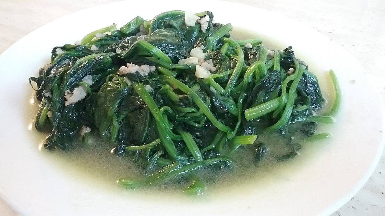 A plate of stir-fried spinach and ground pork